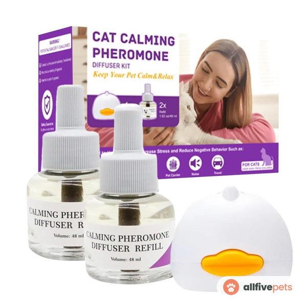 The pheromone diffuser kit box with the plug-in head and two refill bottles